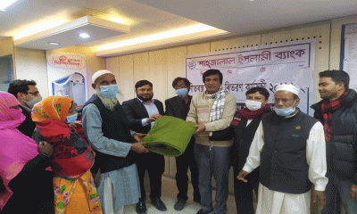 ফরিদপুরে শাহ্জালাল ইসলামী ব্যাংকের শীতবস্ত্র বিতরণ