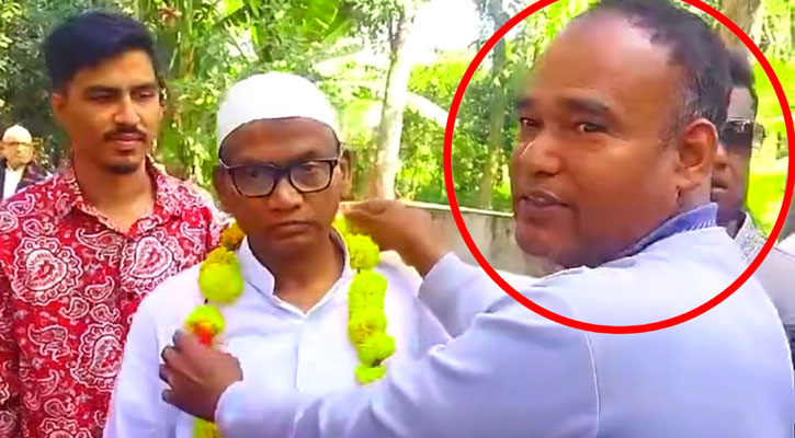 বিস্ফোরক মামলার পলাতক আসামি বিএনপি প্রার্থীকে প্রকাশ্যে ফুলের মালা 