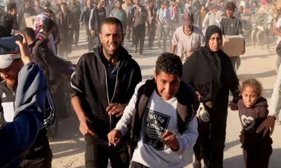 ‘মানুষ দাঁড়িয়ে থাকে একটু খাবারের আশায়, হঠাৎ নেমে আসে গুলির ঝড়’