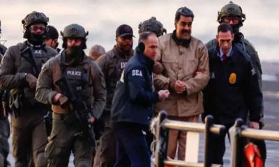 স্ত্রীসহ কয়েদির বেশে মার্কিন আদালতে মাদুরো, তবুও হাসিমুখ