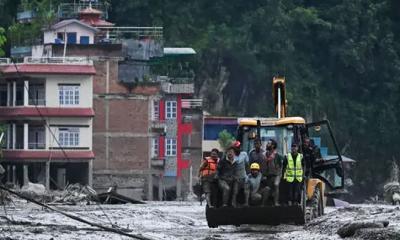 নেপাল ও চীনে বন্যায় নিহত বেড়ে প্রায় ৭০০