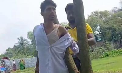চাঁদা নিতে আসা যুবদল নেতাকে গাছে বেঁধে পুলিশকে খবর দিলেন স্থানীয়রা