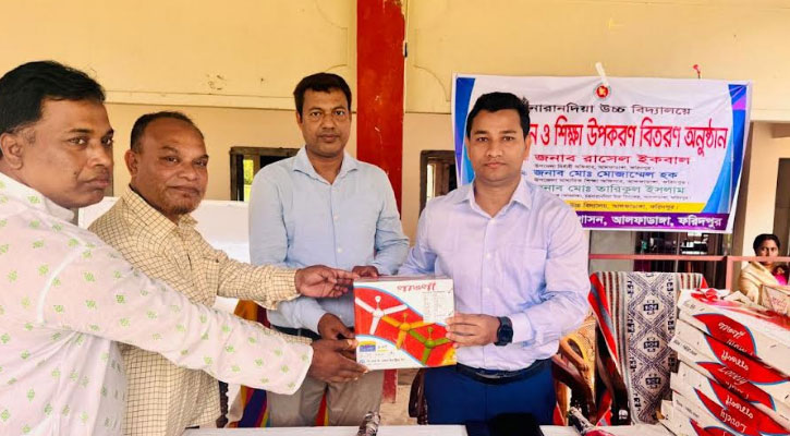 আলফাডাঙ্গায় বিদ্যালয়ে সিলিং ফ্যান ও শিক্ষা উপকরণ বিতরণ